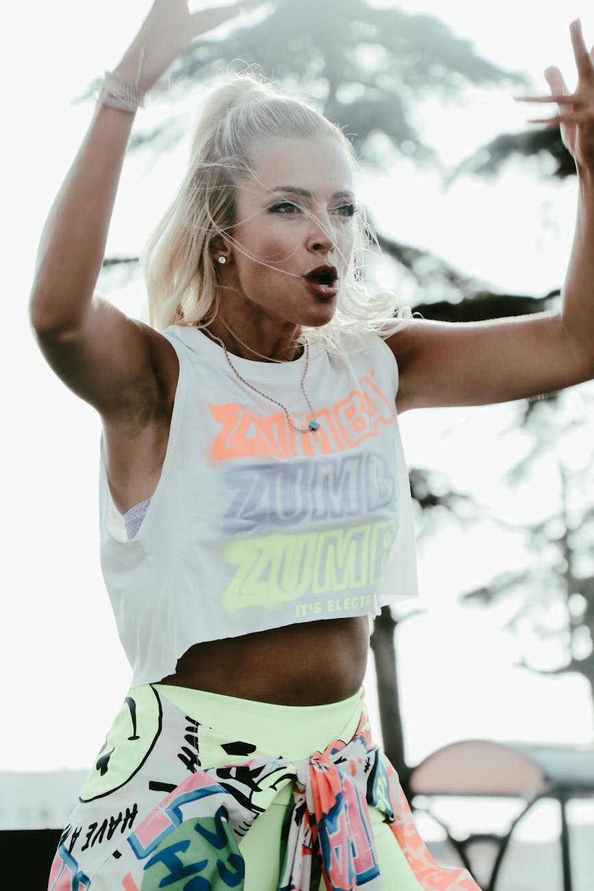 energetic woman in white tank top